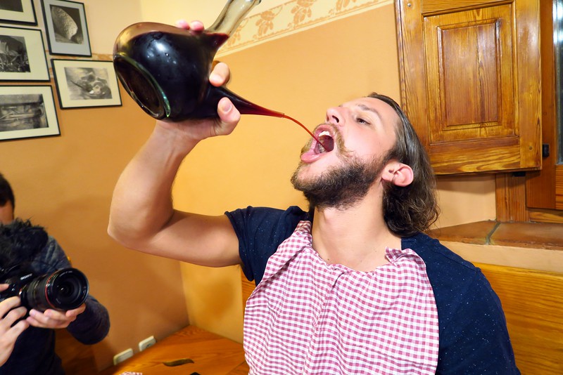 Nicholas Montemaggi showing us how to drink wine from a traditional porro