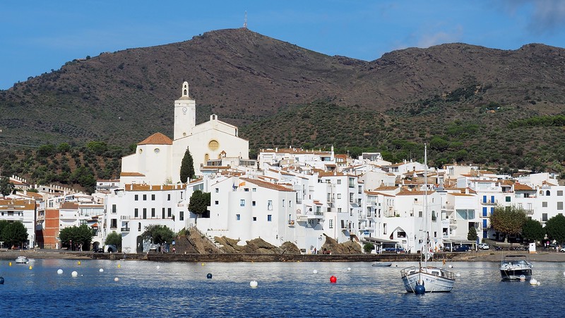 Views of the gorgeous white architecture of Cadaqués from our sailboat in Costa Brava, Catalan, Spain 